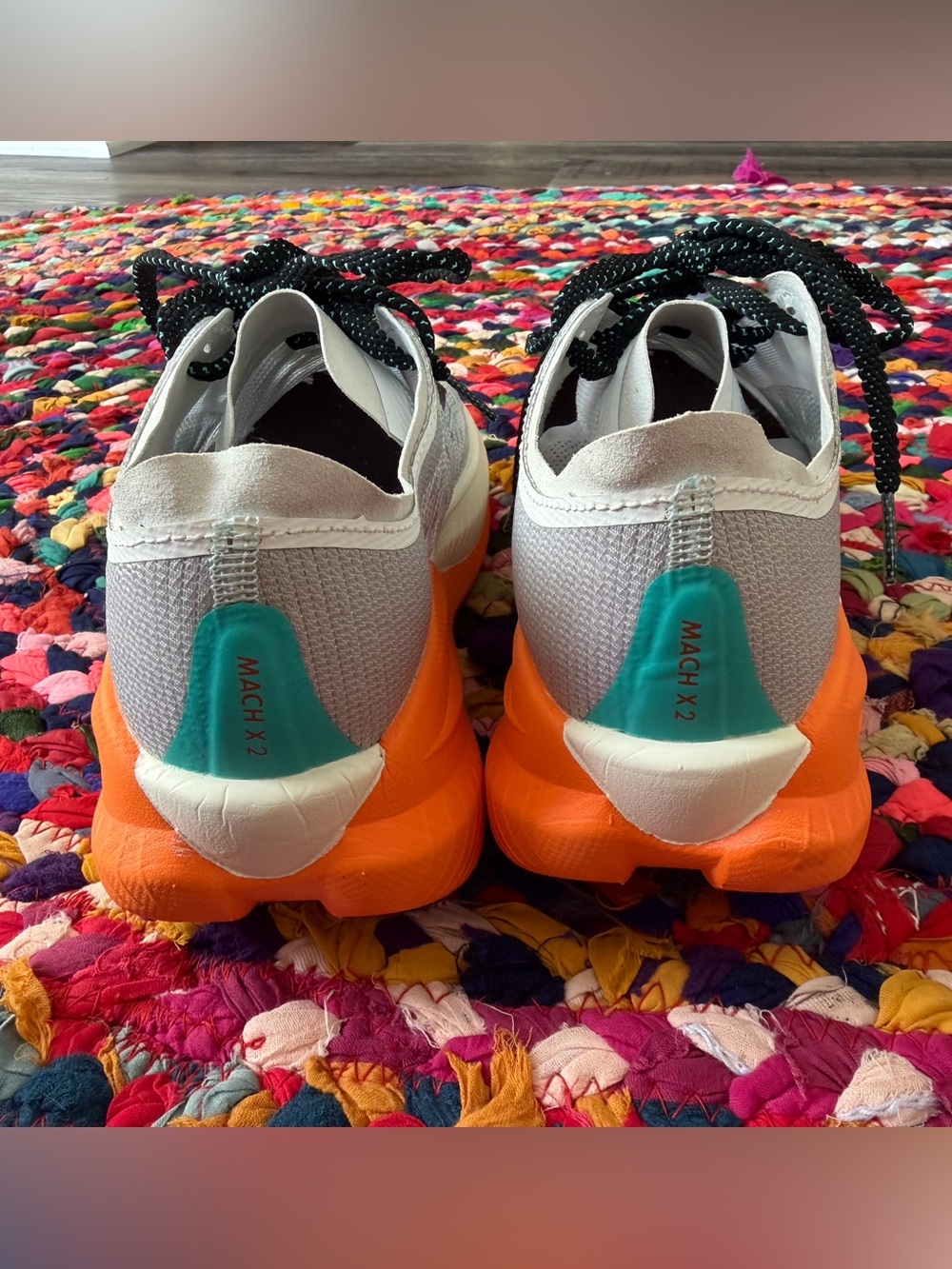 Hoka Mach x2
Women's Light Gray Running Shoes with Orange & Mint Accents - Picture 4 of 8